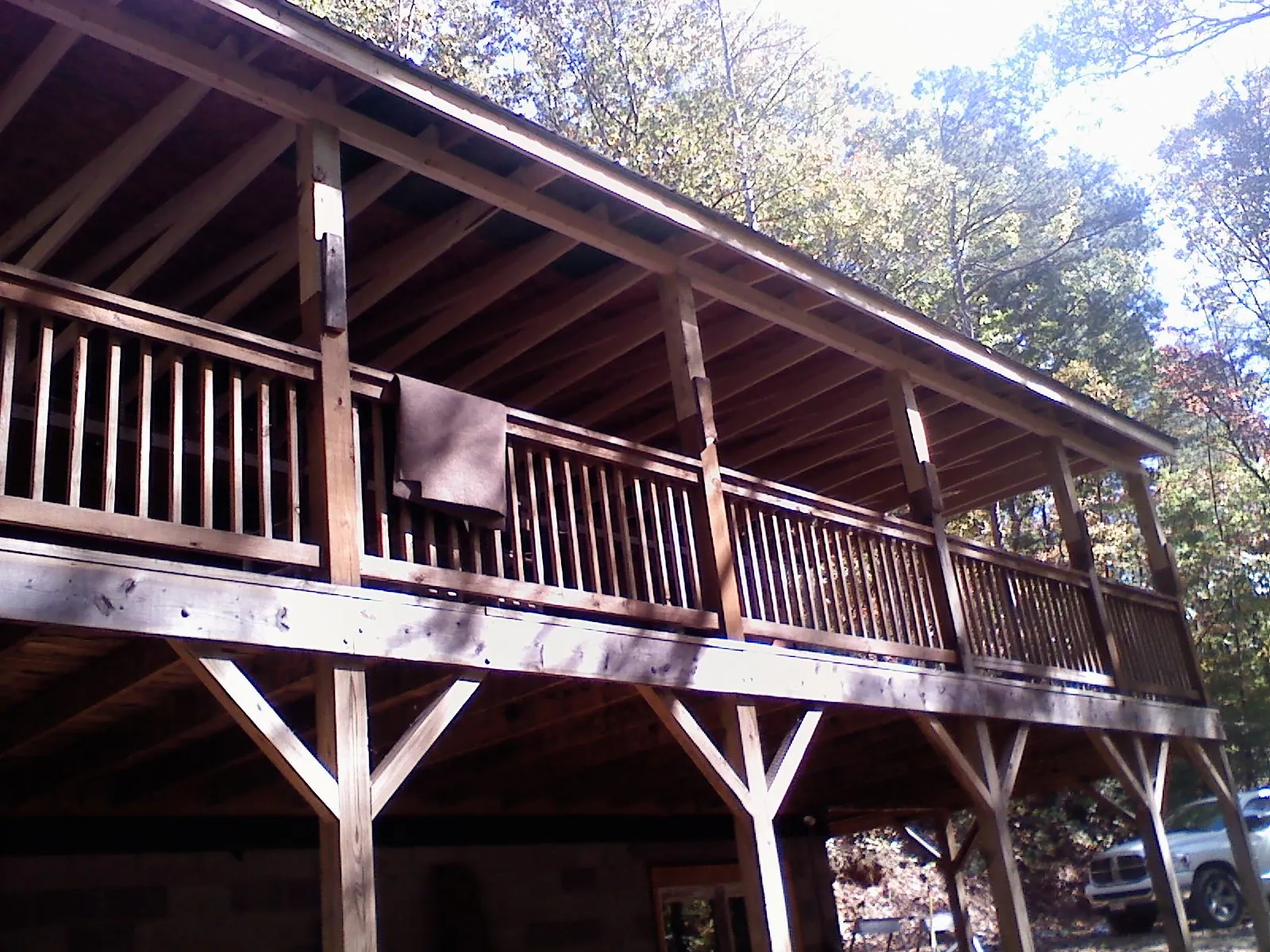 Timber framing under a new elevated porch and deck — Roof Leak Repair in Ranchos De Taos by Roofing Brothers